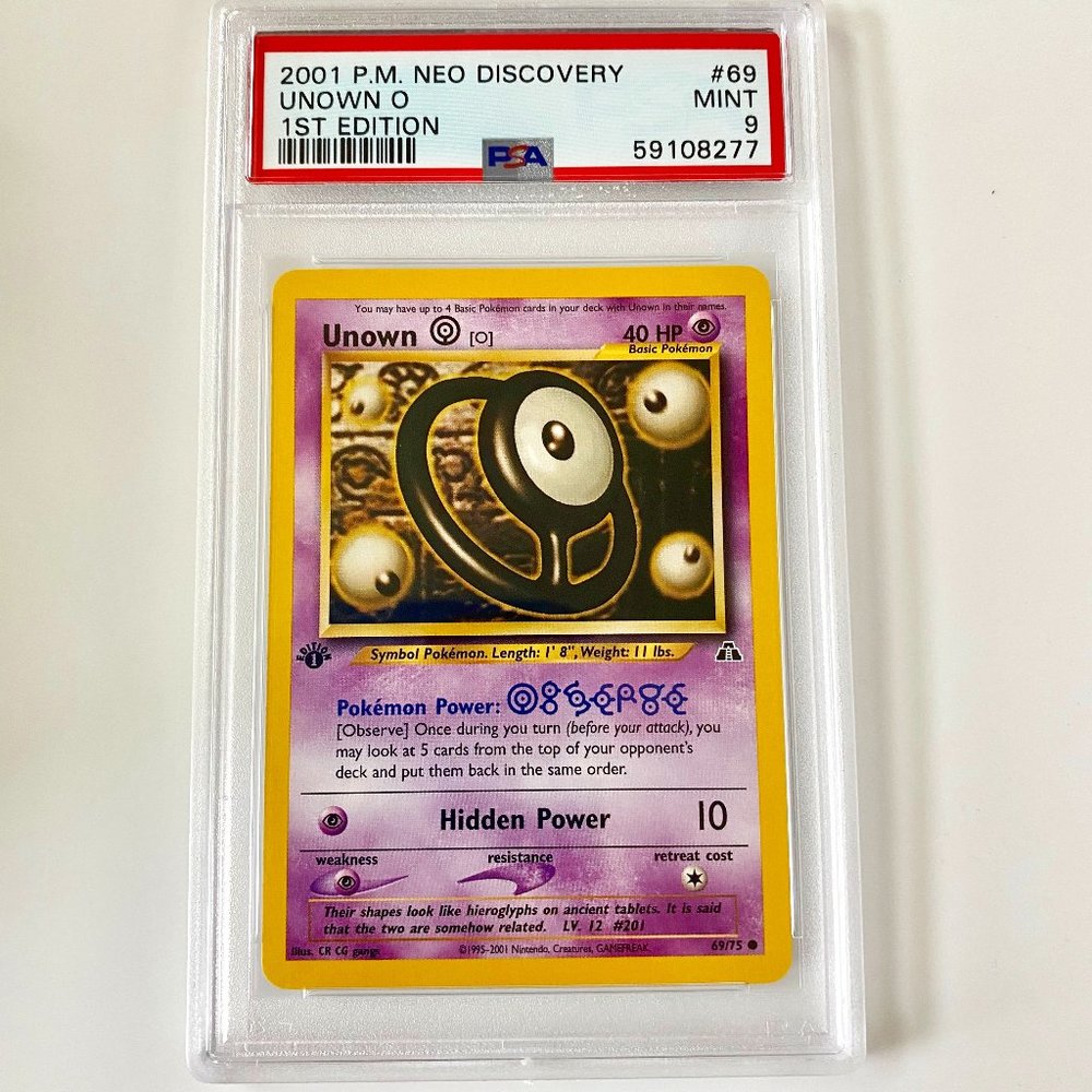 PSA 9 Unown O Mint #69  1st Edition Neo Discovery  2001 Pokémon 59108277